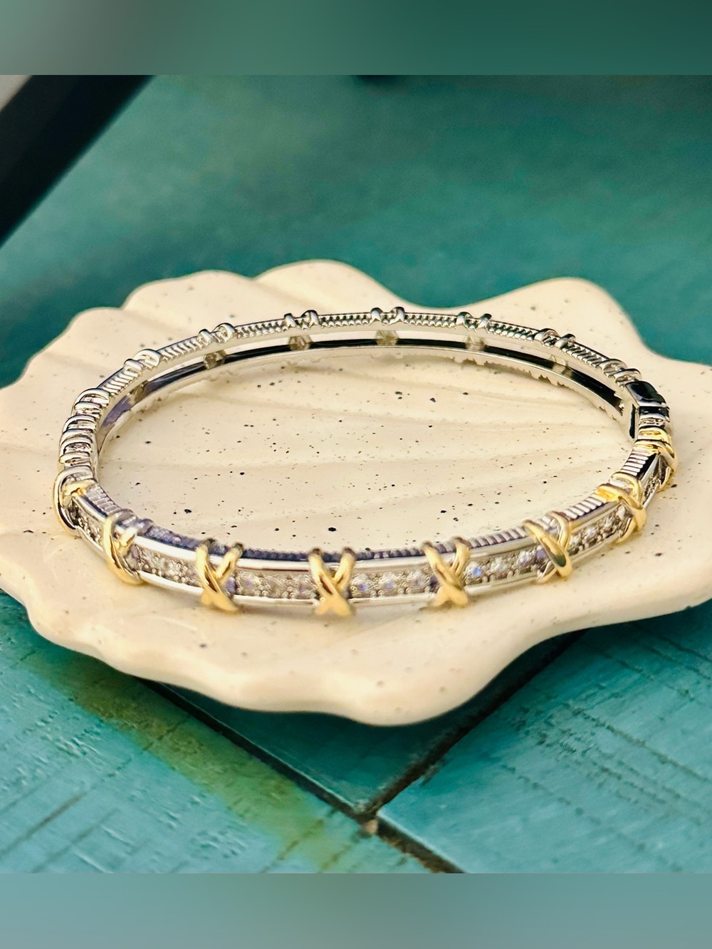 Two-Tone X and CZ Channel Set Hinged Bangle
